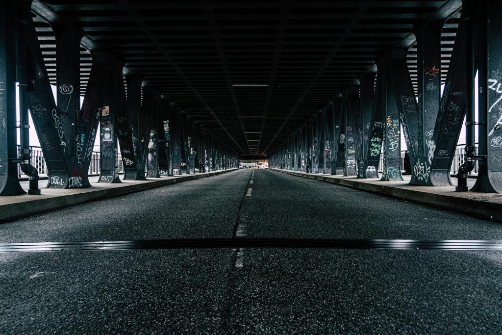 underneath a dark bridge